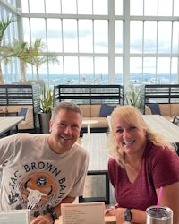 a man and a woman sitting at a table